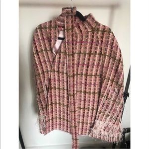 Tweed cape with feathers and belt